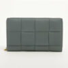 BottegaVenetaIntrecciatoLeatherRound-Zip-WalletGrey1