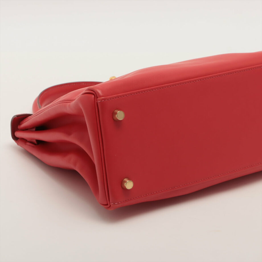 Hermes Kelly 28 bag Veau Gulliver Rouge vif Gold Metal