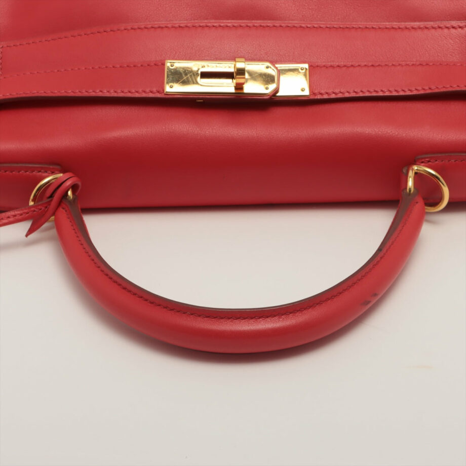 Hermes Kelly 28 bag Veau Gulliver Rouge vif Gold Metal