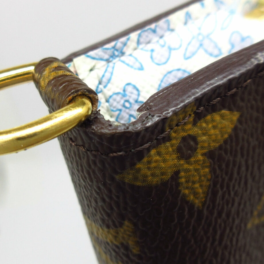 LOUIS VUITTON Portefeuille Insolite