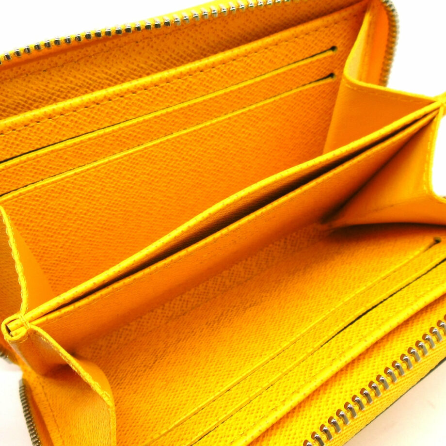 LOUIS VUITTON Porte monnaie Zippy