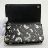 PradaSaffianoLeatherChainwalletBlackxWhite3