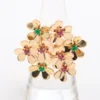 Van Cleef & Arpels Frivole 8 flowers Ruby Emerald Ring